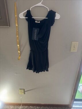 Anna-Kaci Black Ruffled Romper with Draped Neckline